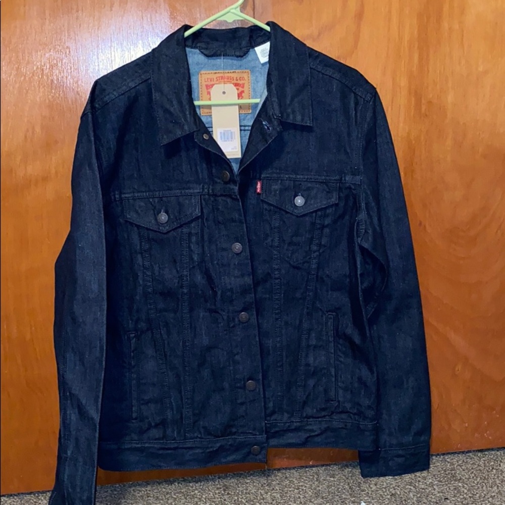 Dark wash Levi’s denim jacket